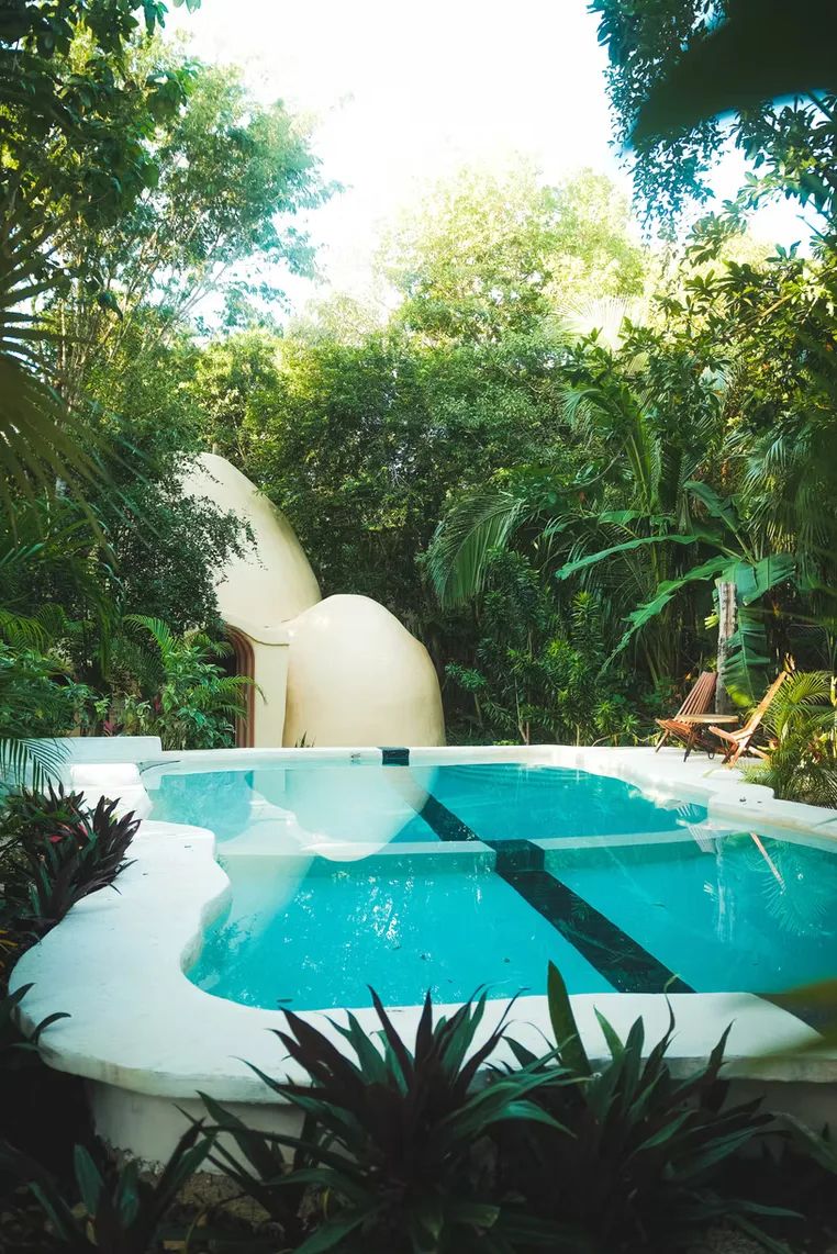 The pool at the Ekumal retreat center, surrounded by jungle